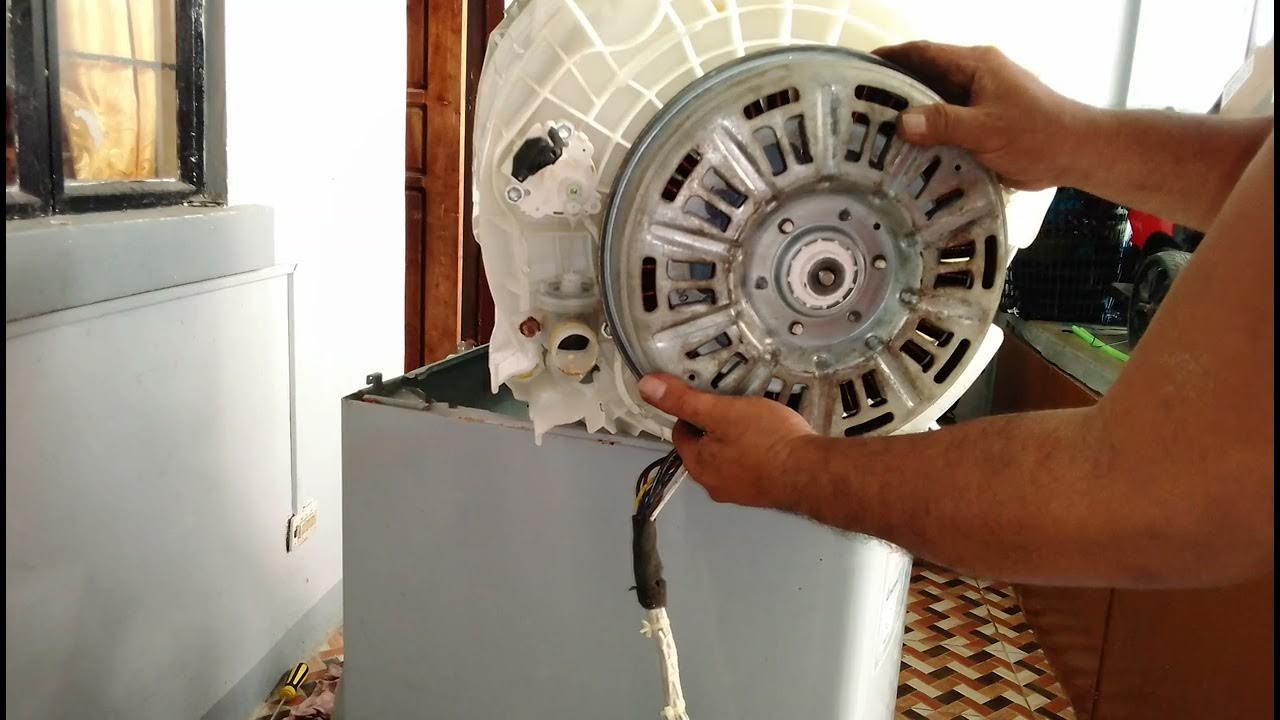 Mechanic repairing Dryer